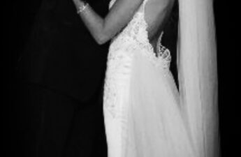 Malia and MJ Wedding Day Kiss Black and White Photo