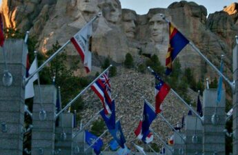 Mount Rushmore National Memorial With Flags Photo
