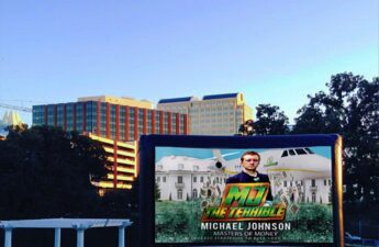 Michael "MJ The Terrible" Johnson and Masters of Money LLC Ad at Movies In The Park in Austin Texas Photo