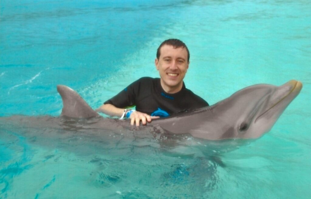 Michael "MJ The Terrible" Johnson Swimming With The Dolphins In The Bahamas at Atlantis Resort Photo #1